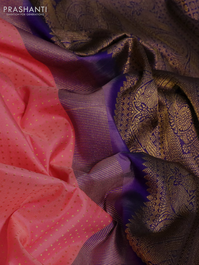 Pure kanchipuram silk saree peach pink and blue with allover zari butta weaves and zari woven korvai border