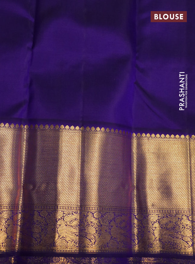 Pure kanchipuram silk saree peach pink and blue with allover zari butta weaves and zari woven korvai border