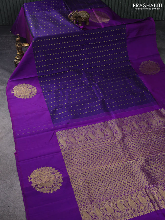 Pure kanchipuram silk saree dark blue and purple with allover zari woven floral 1000 buttas and zari woven peacock butta border