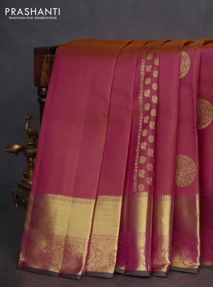 Pure kanchipuram silk saree dual shade of pinkish orange and green with zari weaves & buttas and zari woven border