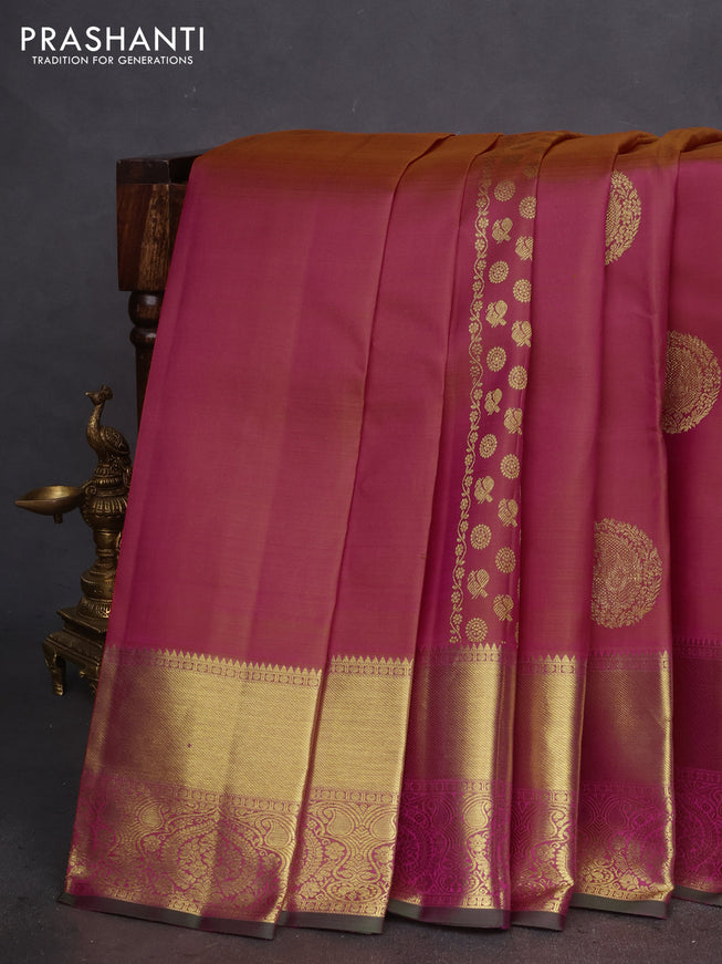 Pure kanchipuram silk saree dual shade of pinkish orange and green with zari weaves & buttas and zari woven border