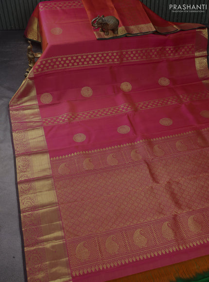 Pure kanchipuram silk saree dual shade of pinkish orange and green with zari weaves & buttas and zari woven border