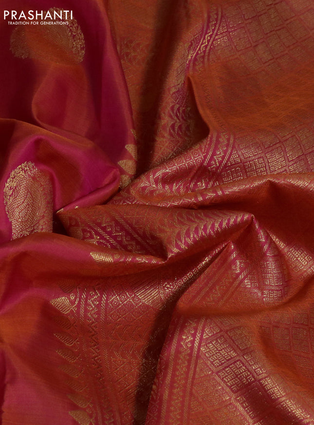 Pure kanchipuram silk saree dual shade of pinkish orange and green with zari weaves & buttas and zari woven border
