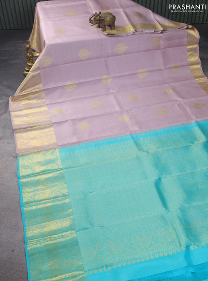 Pure kanchipuram silk saree pastel pink and teal blue with zari woven buttas and long zari woven border