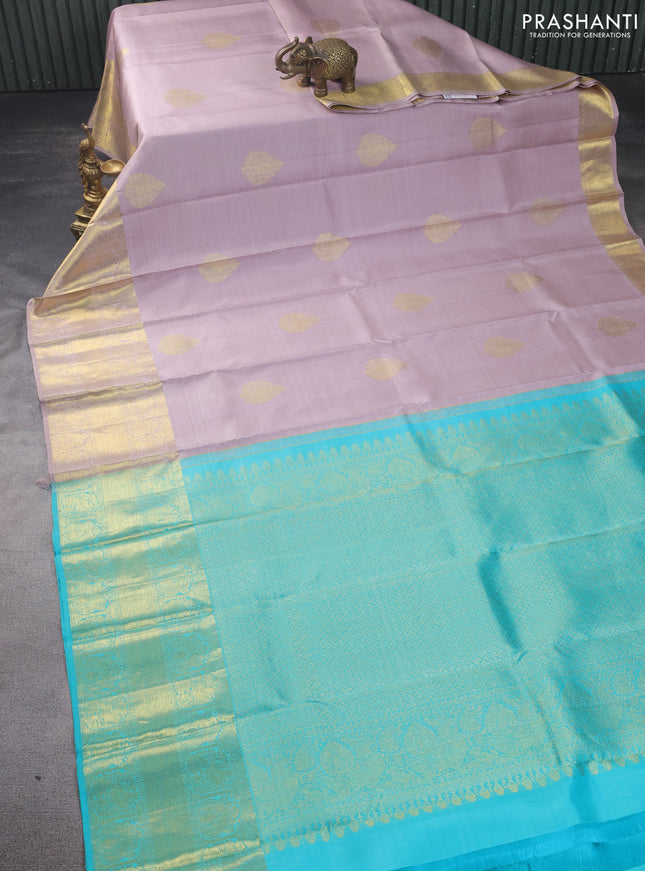 Pure kanchipuram silk saree pastel pink and teal blue with zari woven buttas and long zari woven border