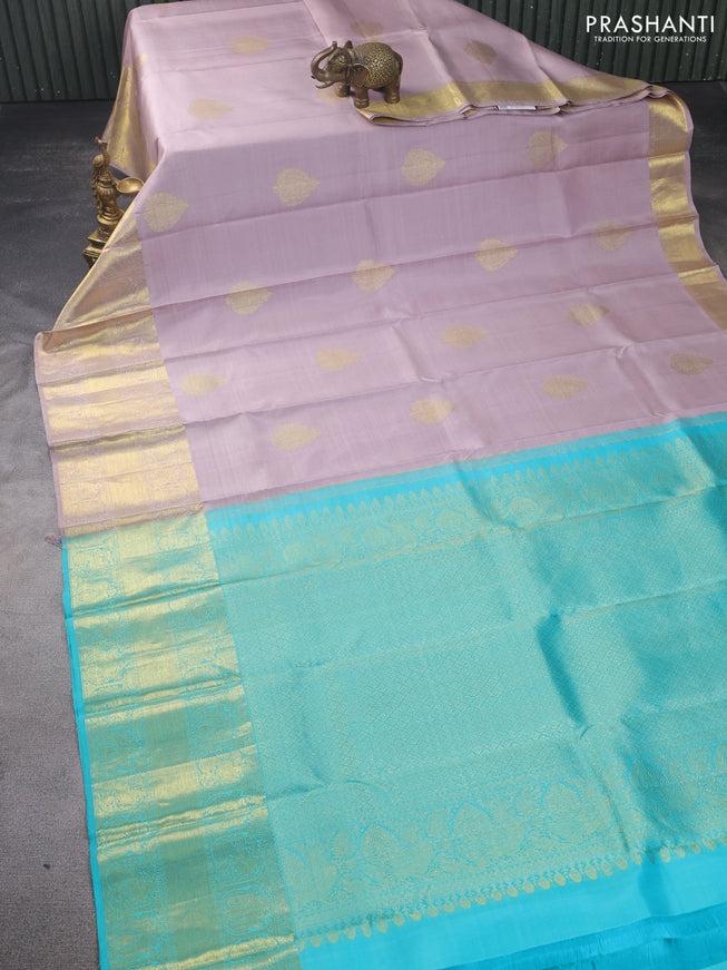 Pure kanchipuram silk saree pastel pink and teal blue with zari woven buttas and long zari woven border