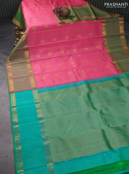 Pure kanchipuram silk saree peach pink and dual shade of teal with zari woven annam buttas and long rettapet zari woven border