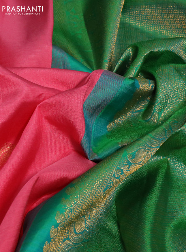Pure kanchipuram silk saree peach pink and dual shade of teal with zari woven annam buttas and long rettapet zari woven border