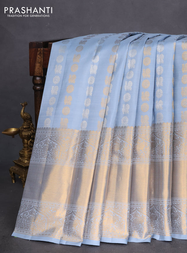 Pure kanchipuram silk saree bluish grey with allover silver & gold zari buttas and long zari woven border
