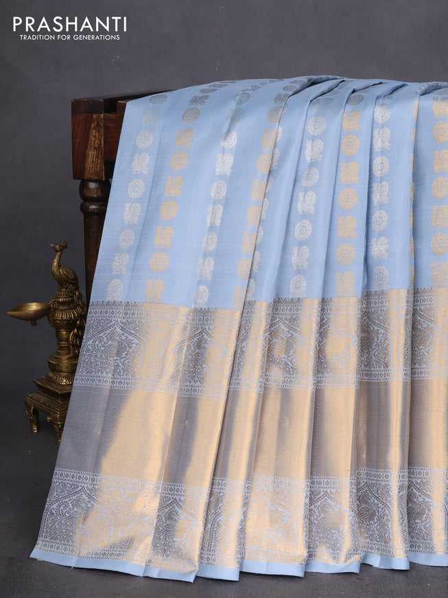 Pure kanchipuram silk saree bluish grey with allover silver & gold zari buttas and long zari woven border