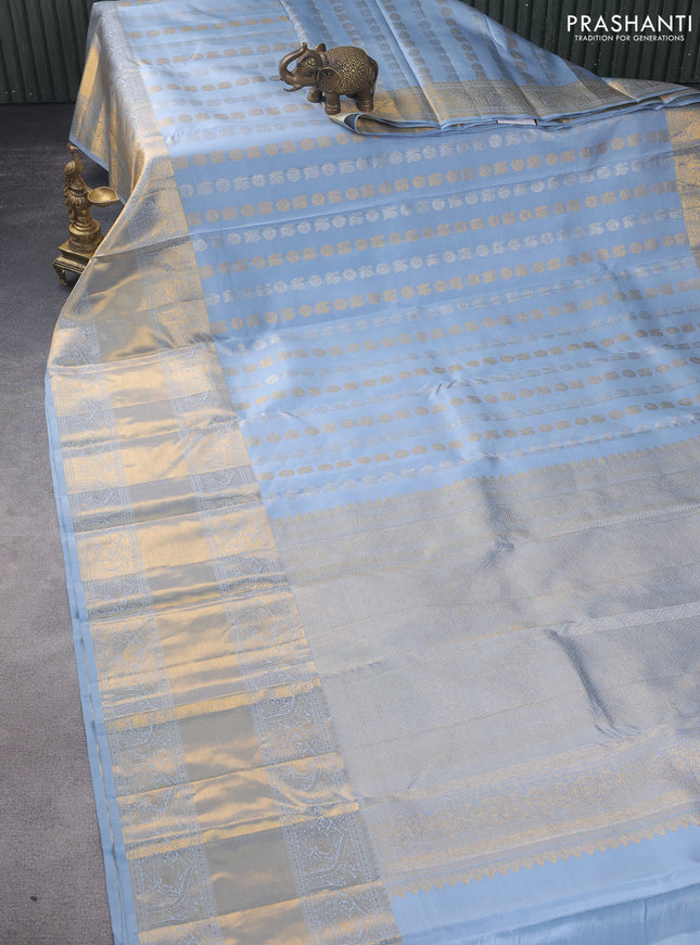 Pure kanchipuram silk saree bluish grey with allover silver & gold zari buttas and long zari woven border