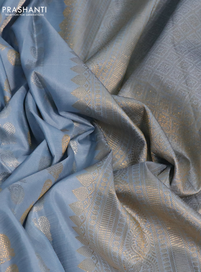 Pure kanchipuram silk saree bluish grey with allover silver & gold zari buttas and long zari woven border