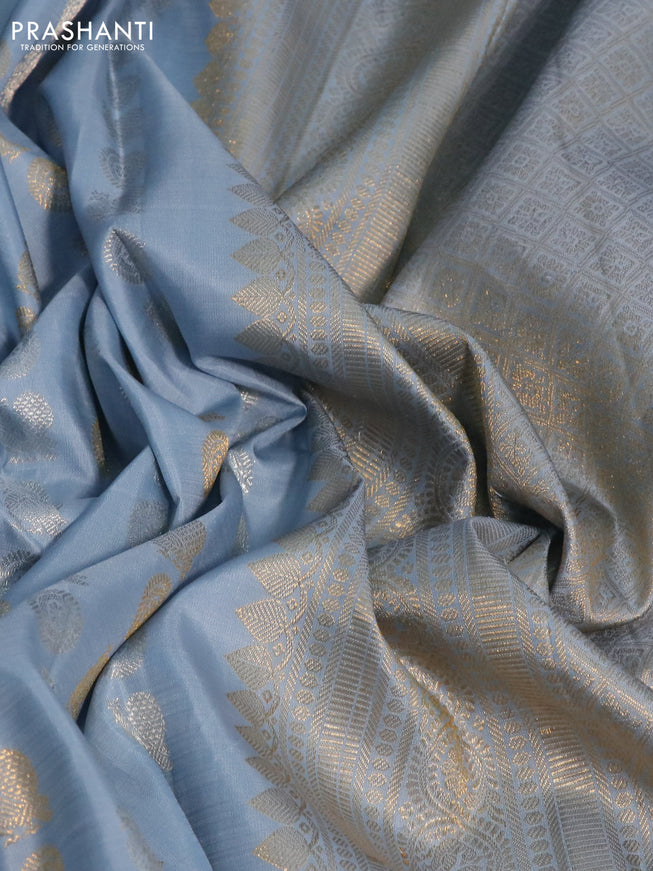 Pure kanchipuram silk saree bluish grey with allover silver & gold zari buttas and long zari woven border