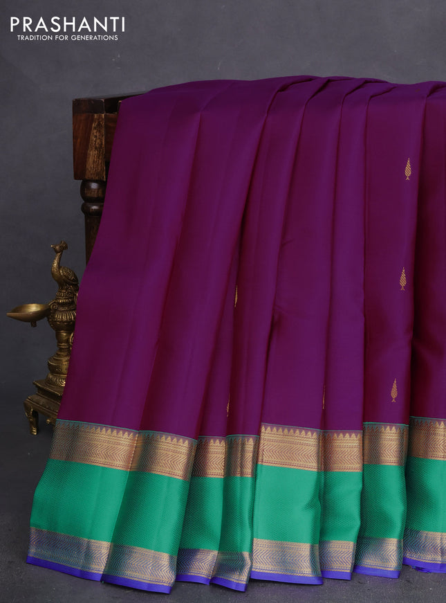 Pure kanchipuram silk saree purple and teal blue with zari woven buttas and rettapet zari woven border