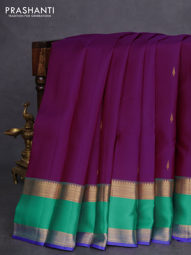 Pure kanchipuram silk saree purple and teal blue with zari woven buttas and rettapet zari woven border