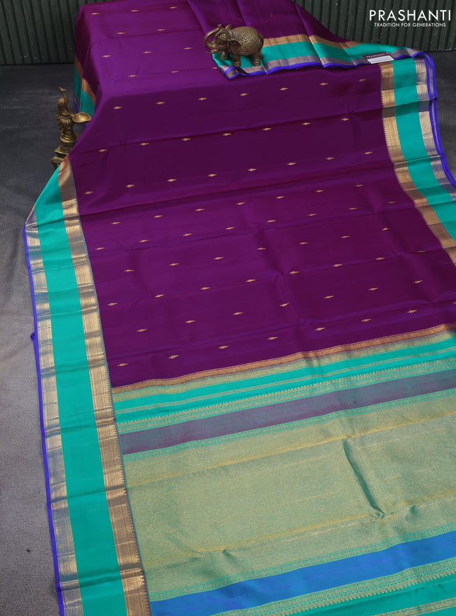 Pure kanchipuram silk saree purple and teal blue with zari woven buttas and rettapet zari woven border