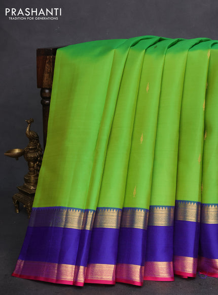Pure kanchipuram silk saree dual shade of green and royal blue pink with zari woven buttas and rettapet zari woven border