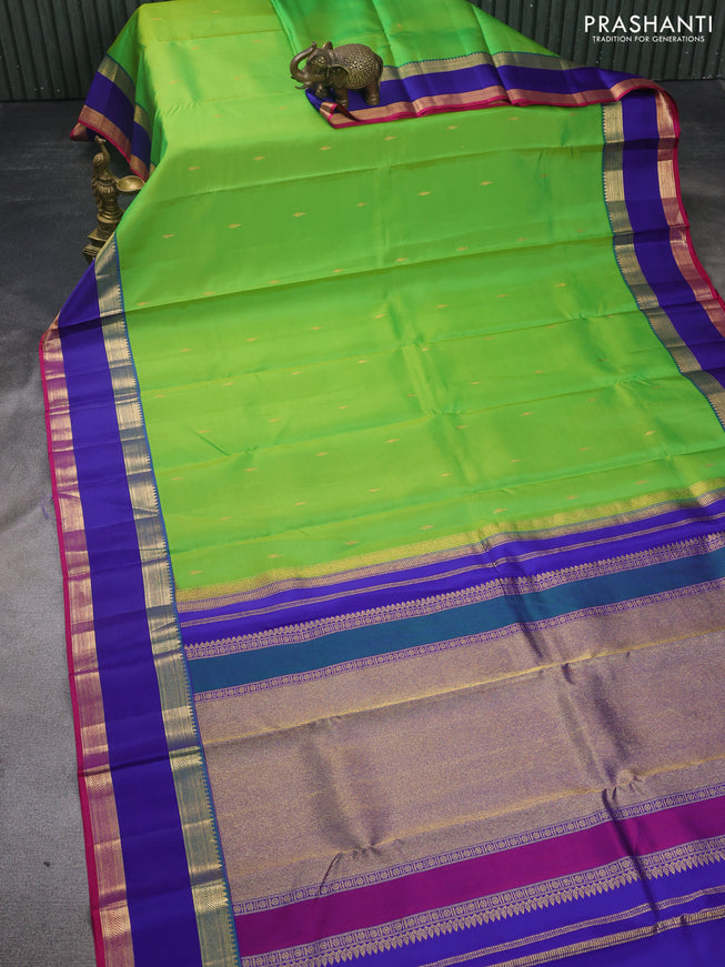Pure kanchipuram silk saree dual shade of green and royal blue pink with zari woven buttas and rettapet zari woven border