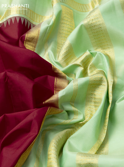 Pure kanchipuram silk saree red and mild pista green with plain body and rettapet zari woven border