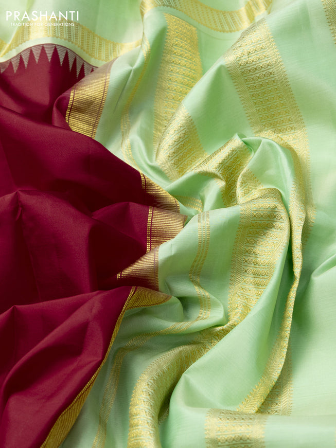 Pure kanchipuram silk saree red and mild pista green with plain body and rettapet zari woven border