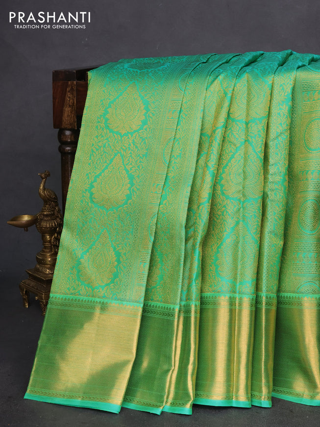 Pure kanchipuram silk saree dual shade of green with allover zari woven brocade weaves and zari woven border
