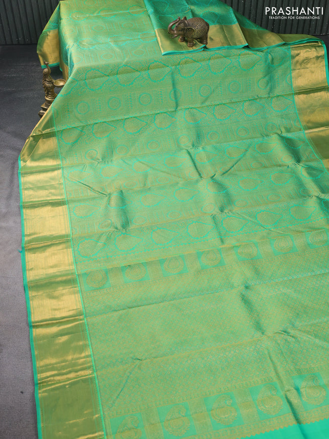 Pure kanchipuram silk saree dual shade of green with allover zari woven brocade weaves and zari woven border
