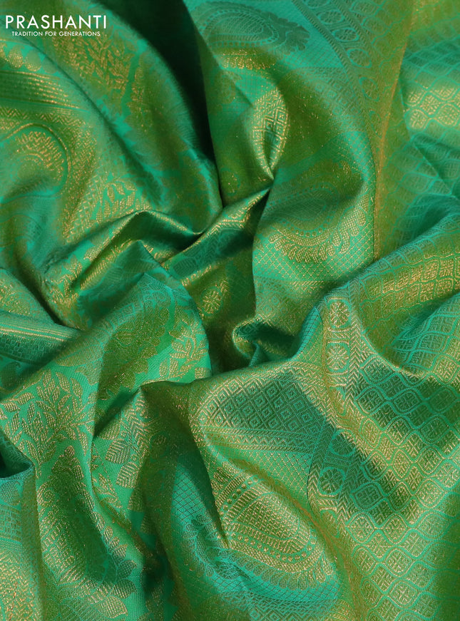Pure kanchipuram silk saree dual shade of green with allover zari woven brocade weaves and zari woven border