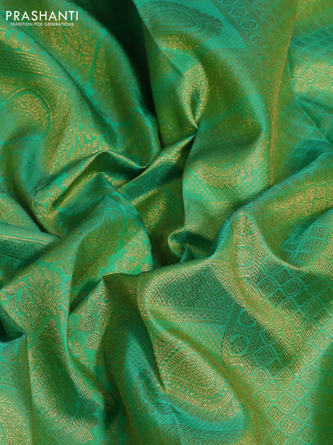 Pure kanchipuram silk saree dual shade of green with allover zari woven brocade weaves and zari woven border