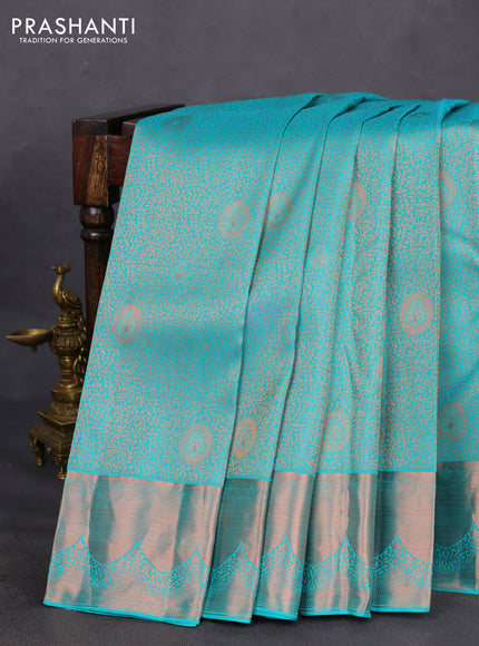 Pure kanchipuram silk saree teal blue shade with allover copper zari wevaes and copper zari woven border