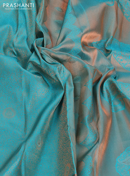 Pure kanchipuram silk saree teal blue shade with allover copper zari wevaes and copper zari woven border