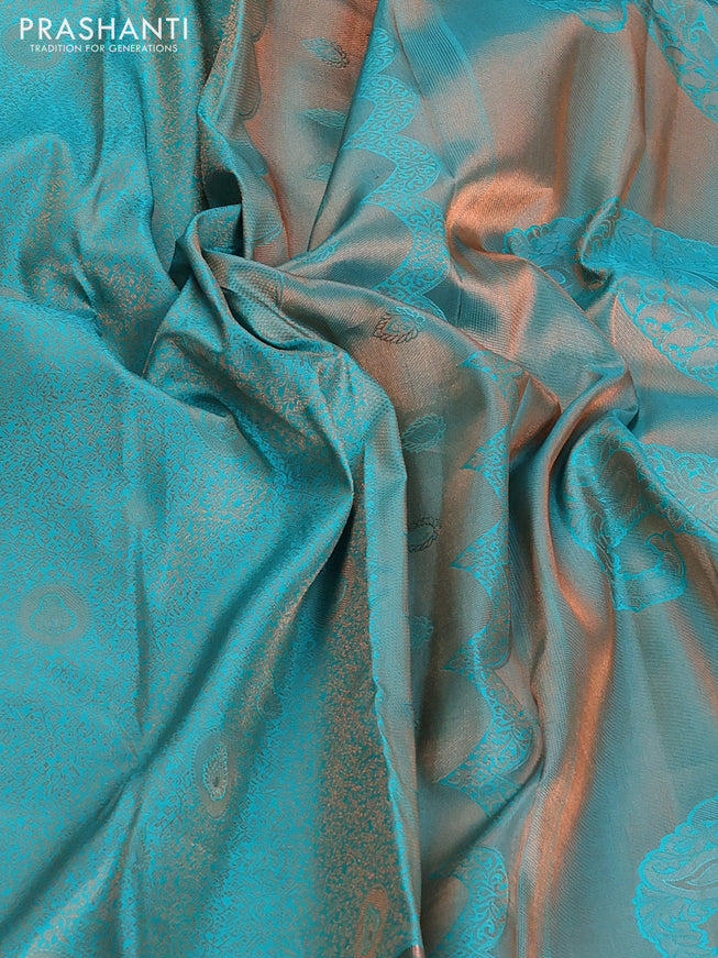 Pure kanchipuram silk saree teal blue shade with allover copper zari wevaes and copper zari woven border