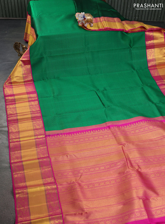 Pure kanchipuram silk saree green and pink with allover self emboss and long rich zari woven border