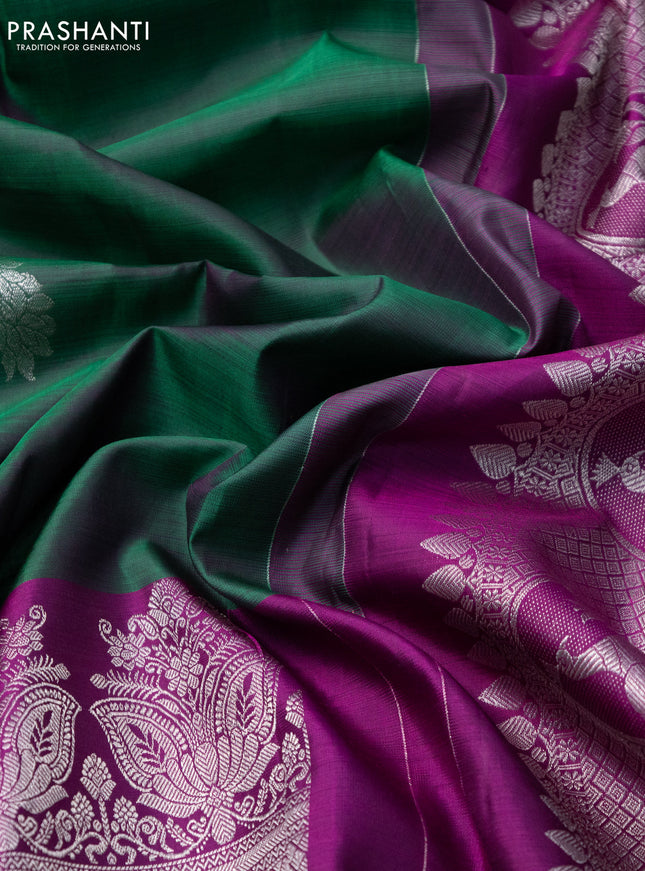 Pure kanchipuram silk saree dual shade of green and purple with silver zari woven peacock buttas and silver zari woven border