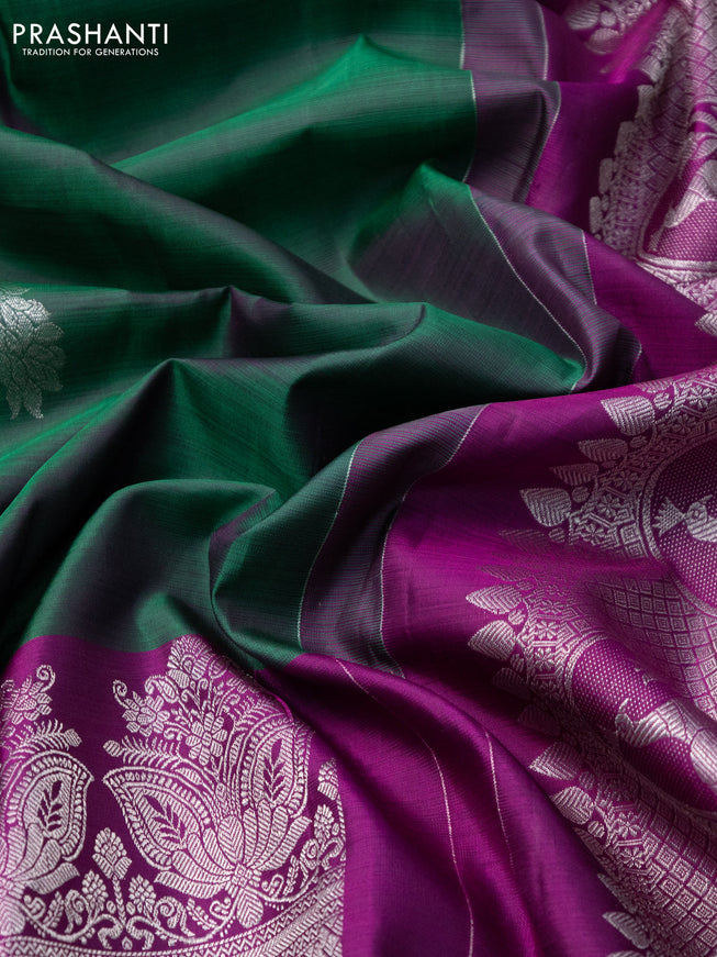 Pure kanchipuram silk saree dual shade of green and purple with silver zari woven peacock buttas and silver zari woven border
