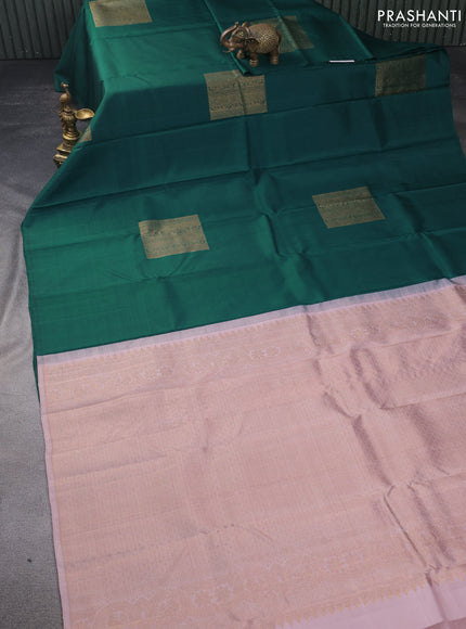 Pure kanchipuram silk saree green and pastel peach shade with box type buttas in borderless style