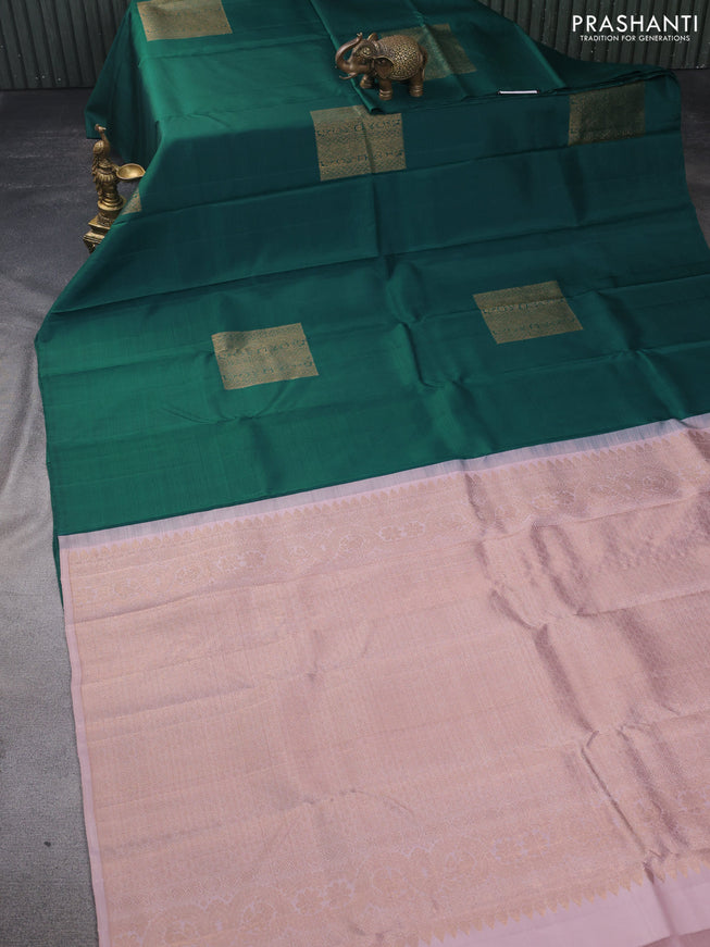 Pure kanchipuram silk saree green and pastel peach shade with box type buttas in borderless style