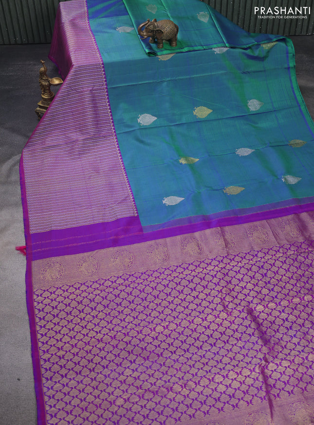 Pure kanchipuram silk saree dual shade of bluish green and dual shade of purple with silver & gold zari woven buttas and long silver & gold zari woven border
