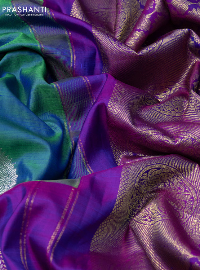 Pure kanchipuram silk saree dual shade of bluish green and dual shade of purple with silver & gold zari woven buttas and long silver & gold zari woven border