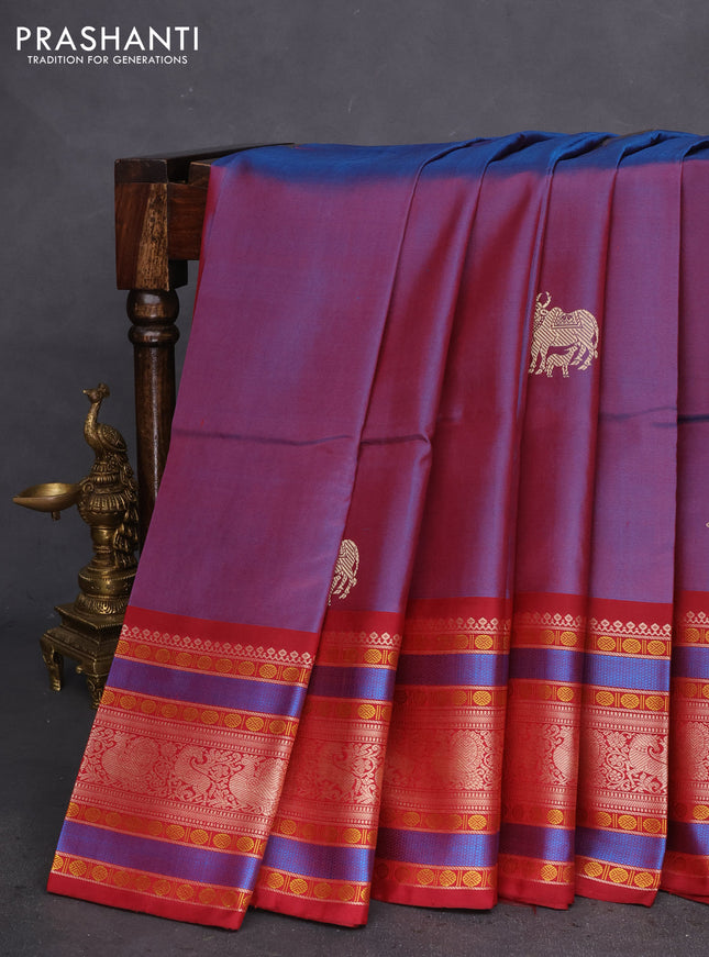 Pure kanchipuram silk saree dual shade of blue and maroon with allover thread buttas and long thread woven border