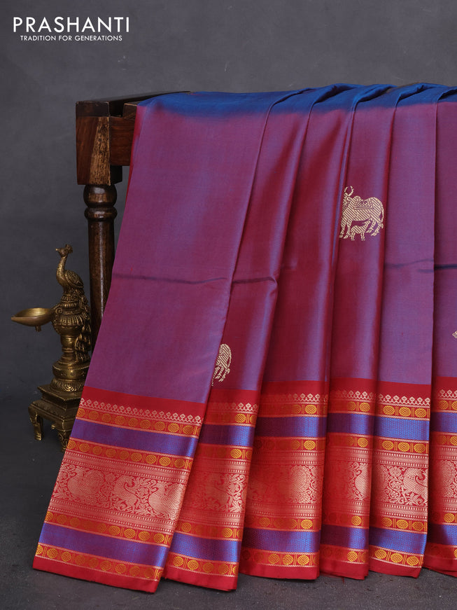Pure kanchipuram silk saree dual shade of blue and maroon with allover thread buttas and long thread woven border