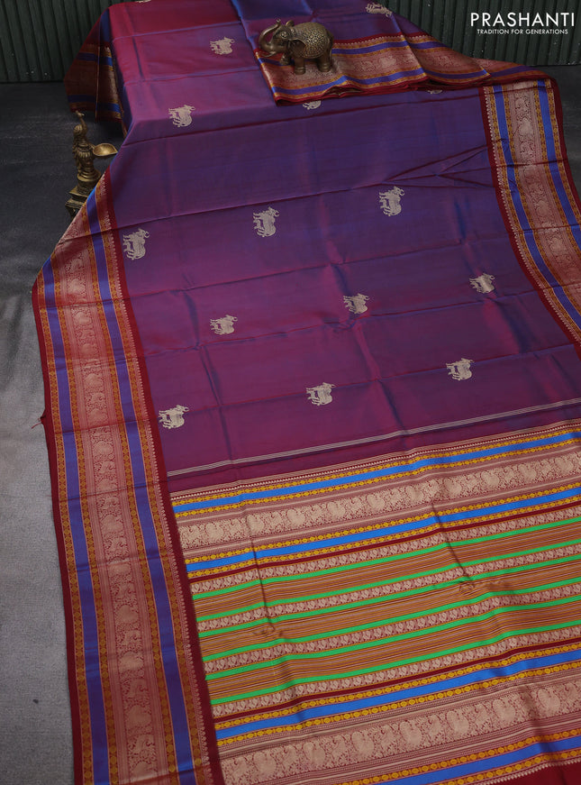 Pure kanchipuram silk saree dual shade of blue and maroon with allover thread buttas and long thread woven border