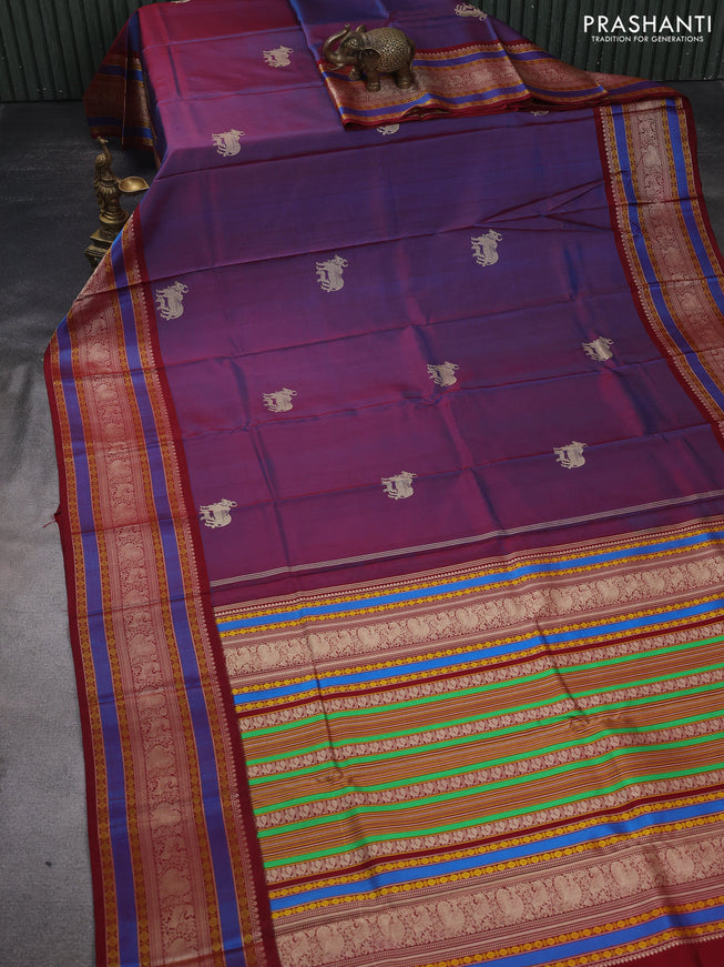 Pure kanchipuram silk saree dual shade of blue and maroon with allover thread buttas and long thread woven border