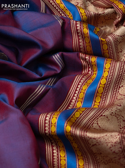 Pure kanchipuram silk saree dual shade of blue and maroon with allover thread buttas and long thread woven border
