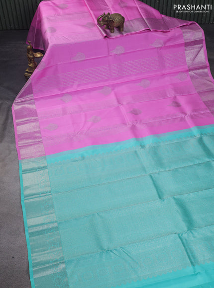Pure kanchipuram silk saree lotus pink and teal shade with allover zari weaves & buttas and zari woven floral border