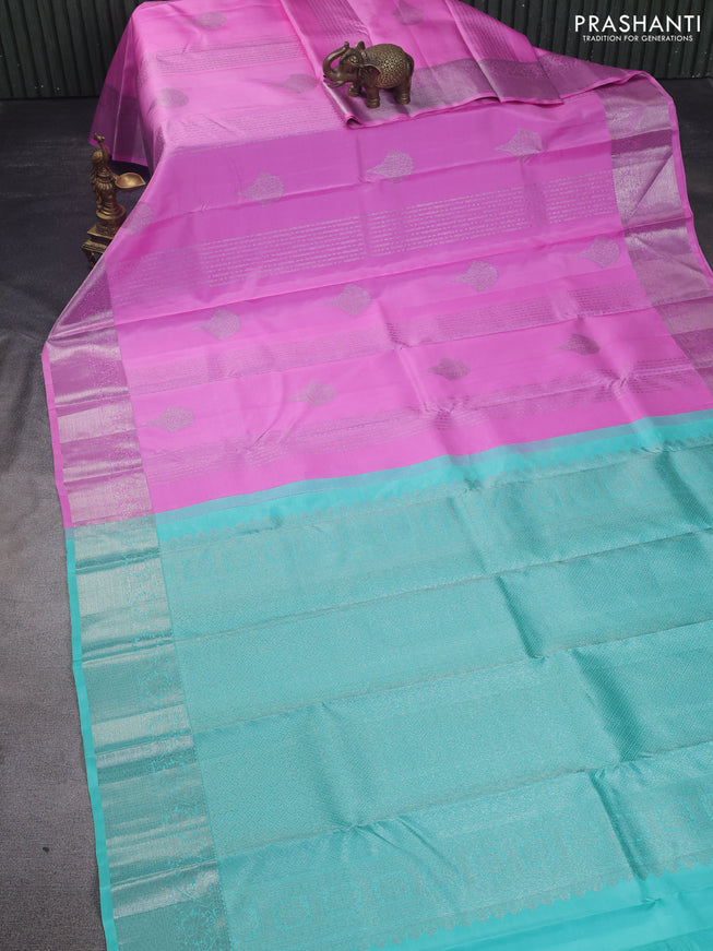 Pure kanchipuram silk saree lotus pink and teal shade with allover zari weaves & buttas and zari woven floral border