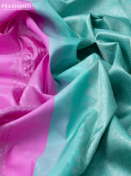 Pure kanchipuram silk saree lotus pink and teal shade with allover zari weaves & buttas and zari woven floral border