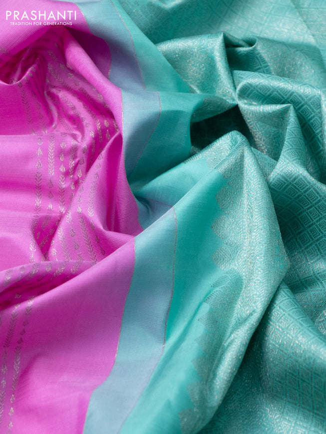 Pure kanchipuram silk saree lotus pink and teal shade with allover zari weaves & buttas and zari woven floral border