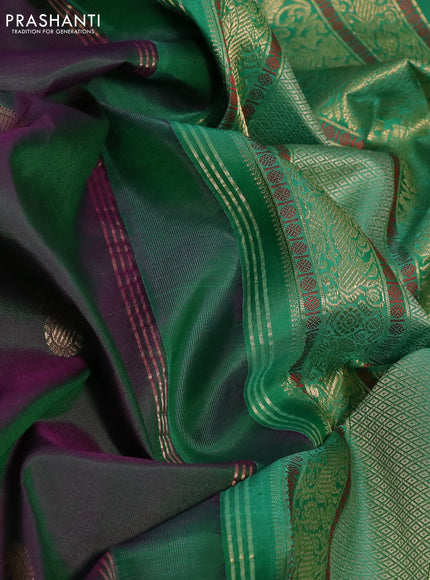 Pure kanchipuram silk saree dual shade of greenish purple and teal green with zari woven buttas and long rettapet zari woven border