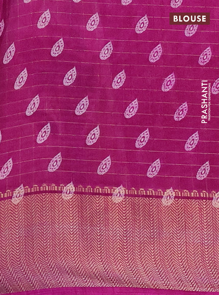 Semi dola saree peach pink and purple with allover zari checks & floral prints and zari woven border