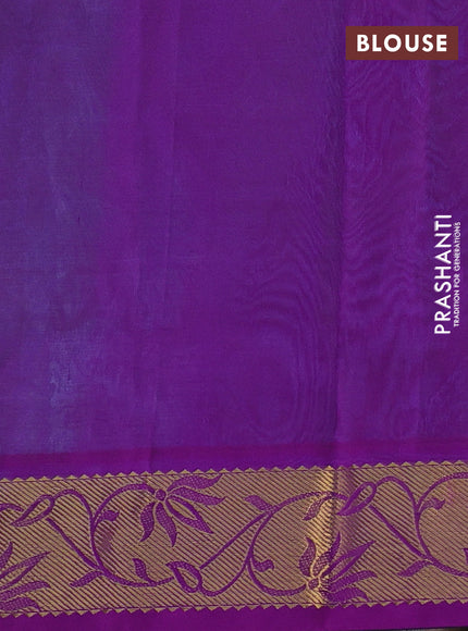 Silk cotton saree dual shade of teal bluish green and purple with allover self emboss jacquard and rich zari woven border